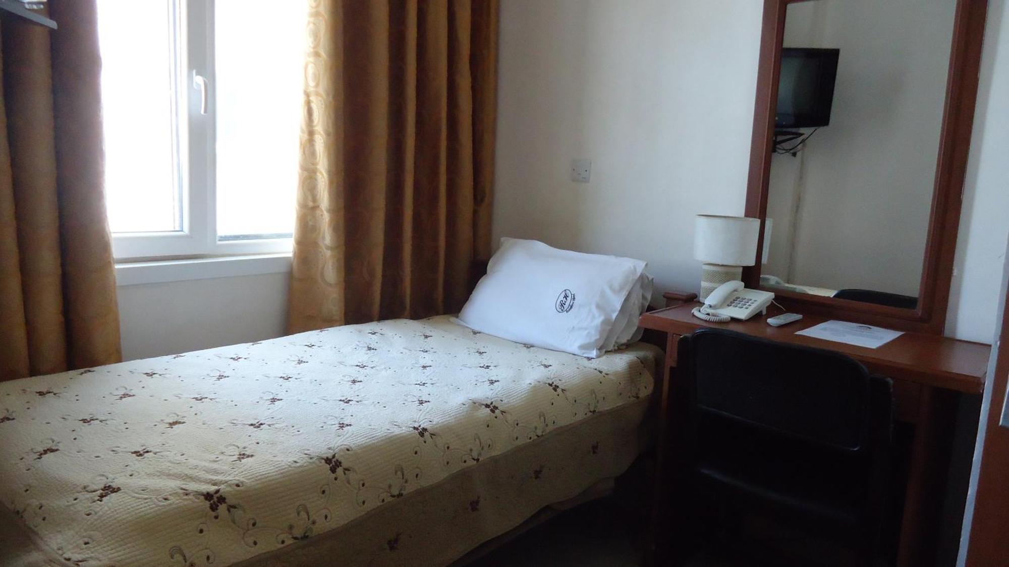 Rainbow Hotel Dar es Salaam Kamer foto
